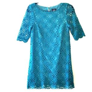 Swing dress with lace overlay and elbow sleeves